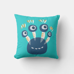 Niedliches blaues Cartoon-Monster mit vier Kissen