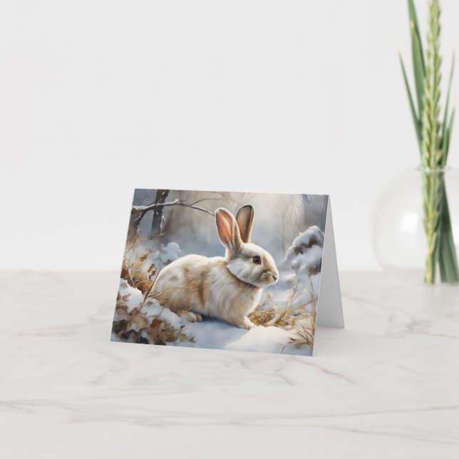 Niedliches braunes und weißes Kaninchen im Schneeb Karte (Vorderseite)