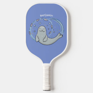 Niedliches glückliches Siegel und Cartoon in Fisch Pickleball Schläger