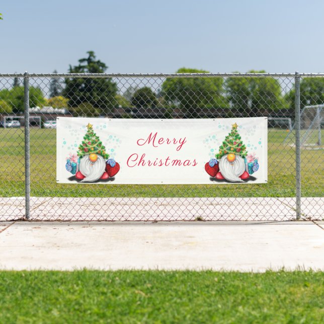 Niedliches Gnome mit Weihnachtsbaumhut und Geschen Banner (Insitu)