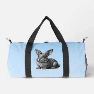 Niedliches graues Kaninchen gegen den blauen Himme Duffle Bag