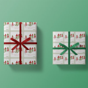 Niedliches grün-rotes Dorf im Schnee zu Weihnachte Geschenkpapier