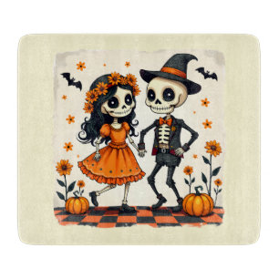 Niedliches Halloween Skeleton-Paar in Orange Schneidebrett