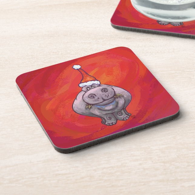 Niedliches Hippo in Weihnachtsmannmütze auf Rot Getränkeuntersetzer (Linke Seite)