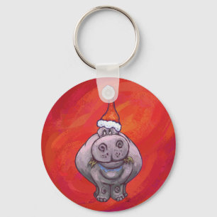 Niedliches Hippo in Weihnachtsmannmütze auf Rot Schlüsselanhänger