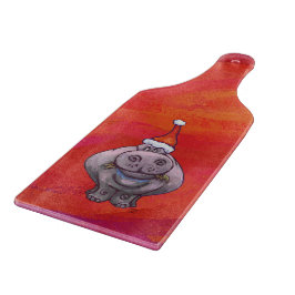 Niedliches Hippo in Weihnachtsmannmütze auf Rot Schneidebrett