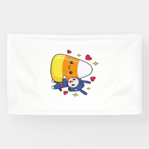 Niedliches Kaninchen umarmt Candy Corn Banner