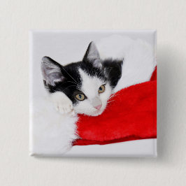 Niedliches Kätzchen in der Weihnachtsmannmütze Button