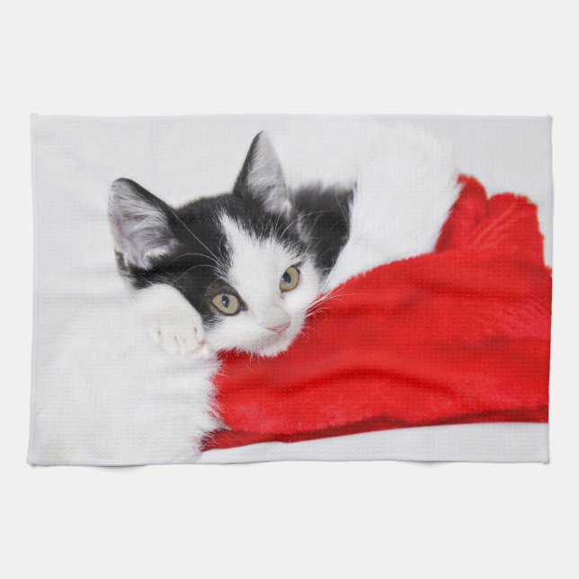 Niedliches Kätzchen in der Weihnachtsmannmütze Geschirrtuch (Horizontal)