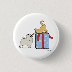 Niedliches Keeshond-Welpen-und Button