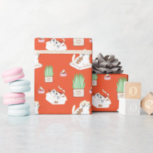 Niedliches Kittmuster in rotem Umschlagpapier Geschenkpapier