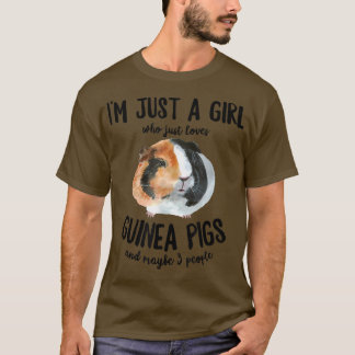 Niedliches Mädchen, das Guinea Lieben Schweine und T-Shirt