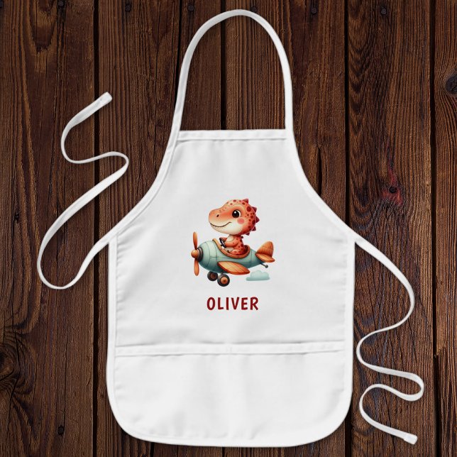 Niedliches Pilotenflugzeug mit Dinosaurier Kinderschürze (Von Creator hochgeladen)