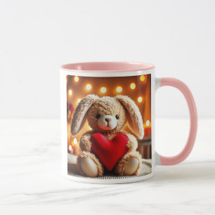 Niedliches Plüschkaninchen mit rotem Herzen. Tasse