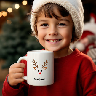 Niedliches Rentier-Gesicht mit rotem Notennamen Kaffeetasse