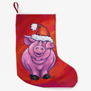 Niedliches Schweinefleisch in Weihnachtsmannmütze Kleiner Weihnachtsstrumpf