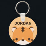 Niedliches Tiger mit Personalisiertem Namen Schlüsselanhänger<br><div class="desc">Ein niedliches Design,  das Ihren Tag aufhellt. Dieses Design bietet eine niedliche Tiger Cartoon-Abbildung mit personalisiertem Namen in braun modernen Sans Serif Schriftart Stil auf pastellorange Hintergrund. Perfekte personalisierte Geschenke für Kinder.</div>