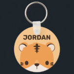 Niedliches Tiger mit Personalisiertem Namen Schlüsselanhänger<br><div class="desc">Ein niedliches Design,  das Ihren Tag aufhellt. Dieses Design bietet eine niedliche Tiger Cartoon-Abbildung mit personalisiertem Namen in braun modernen Sans Serif Schriftart Stil auf pastellorange Hintergrund. Perfekte personalisierte Geschenke für Kinder.</div>