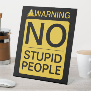 NO Stupid People - Vorsicht beim Signieren Sockelschild