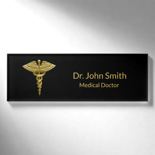 Nobler medizinischer GoldCaduceus auf Schwarzem - Namenschild