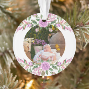 Noël du bébé avec cadre de fleurs