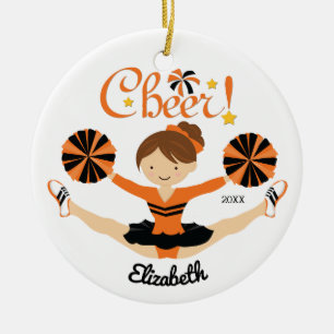 Noir et ornement de pom-pom girl de brune