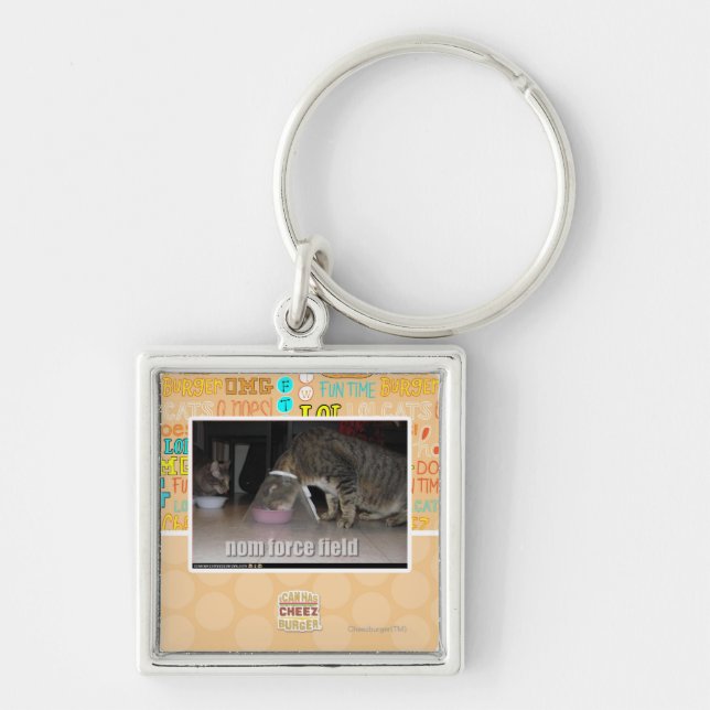 nom Kraftfeld Schlüsselanhänger (Vorne)