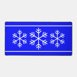Nordische Schneeflocken auf dem blauen Royal Blue Schreibtischunterlage