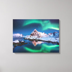 Nordlichter und schneebedeckte Berge Leinwanddruck