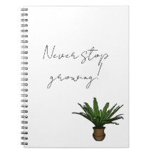 Notebook mit gepunkteter Pflanze "Stoppt nie zu wa