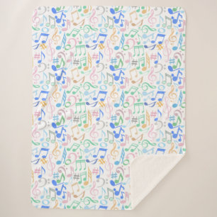 Noten und Symbole Muster pastellfarben.w Sherpadecke
