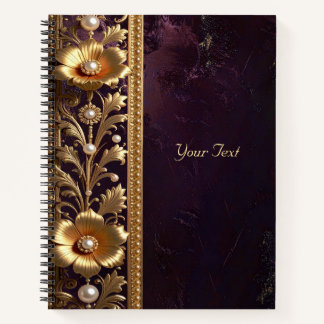 Notizbuch mit goldenem Blumenschmuck und Perlen