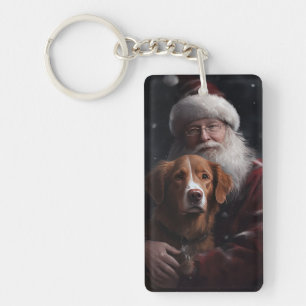 Nova Scotia Duck Tolling Retriever mit Santa Claus Schlüsselanhänger
