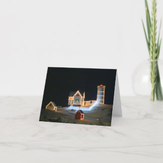 Nubble Light auf einer schneebedeckten Nacht. Mitt