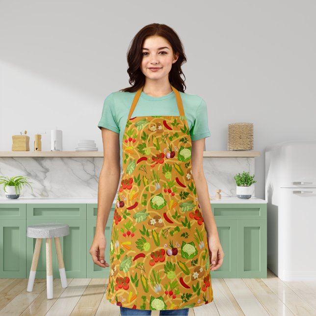 Nudeln und farbiges Gemüse, orange Schürze (Von Creator hochgeladen)