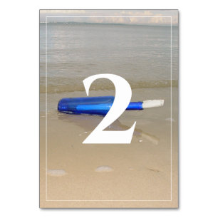 Numéro De Table Bouteille Sur Mariage De Sable De Plage