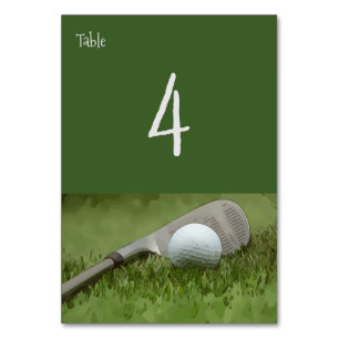Numéro De Table Fer et balle de golf sur gazon vert