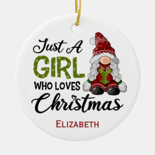 Nur ein Mädchen, das Weihnachten mit einem gefloch Keramik Ornament