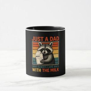 Nur ein Vater, der immer wieder mit der Milch zurü Tasse