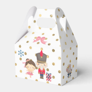 Nutcracker auf dem weißen und goldenen Polka-Punkt Geschenkschachtel