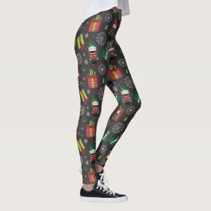 Nutcracker und präsentiert Weihnachtsmuster auf Gr Leggings