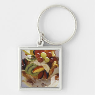 Obstsalat mit Eiscreme. Schlüsselanhänger