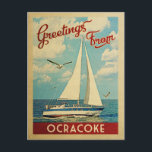 Ocracoke Sailboat Vintage Reise North Carolina Postkarte<br><div class="desc">Diese Grüße aus Ocracoke North Carolina Jahrgang nautische Reise-Design verfügt über ein Boot Segelboot auf dem Wasser mit Möwen und einen blauen Himmel gefüllt mit prächtigen puffigen weißen Wolken.</div>