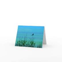 Oiseau sur une carte en silhouette d'arbre