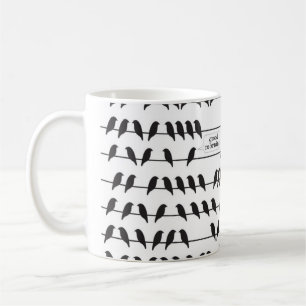 oiseau sur une tasse de fil
