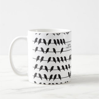 oiseau sur une tasse de fil