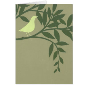 Oiseau vert perché sur une branche verte