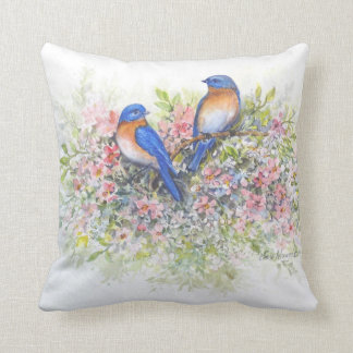 Oiseaux bleus et coussin de fleurs