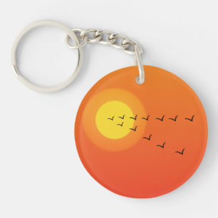 Oiseaux volant vers le soleil