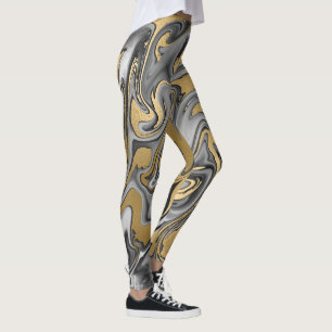 Ölteppich aus schwarzem, weißem und goldgelbem Mar Leggings